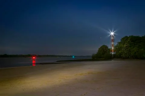Lighthouse at the Beach Stock Photos