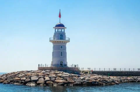 Lighthouse on the beach Stock-Fotos