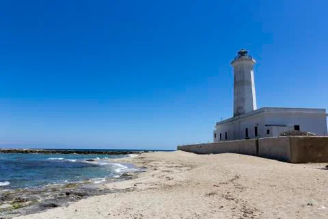 Lighthouse on the beach, Salento 写真素材
