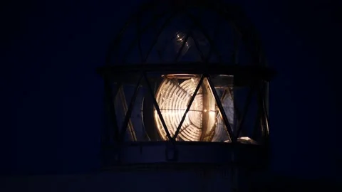 Lighthouse with beacon light in the night. Stock Footage 143023570