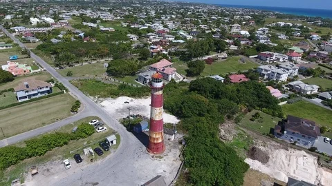 Lighthouse beacon tower on an island Stock Footage 88576347