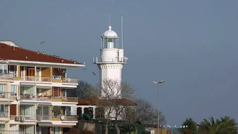 Lighthouse on blue sky background Stock Footage 76006397