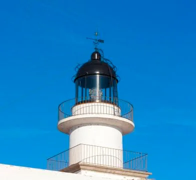 The lighthouse on blue sky background Stock Photos
