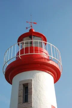 Lighthouse on a blue sky Stock Photos