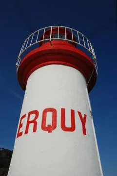 Lighthouse on a blue sky Stock Photos