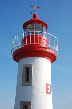 Lighthouse on a blue sky Stock Photos