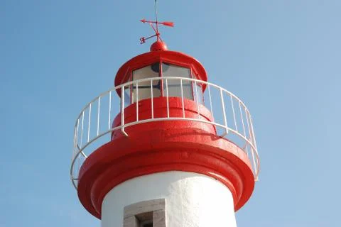 Lighthouse on a blue sky Stock Photos