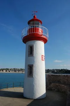 Lighthouse on a blue sky Stock Photos