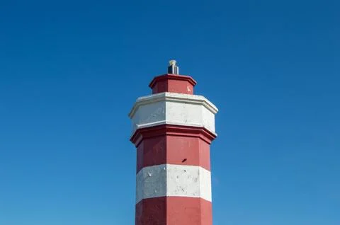 A lighthouse with blue sky Stock Photos