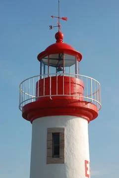 Lighthouse on a blue sky Stock Photos