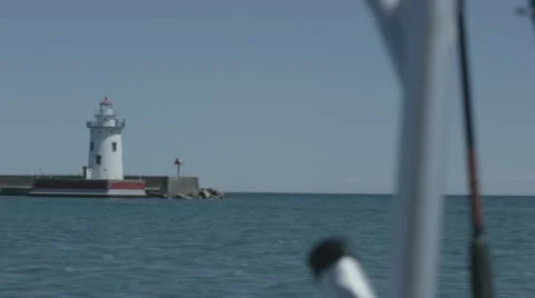 Lighthouse from boat perspective Stock Footage 62637364