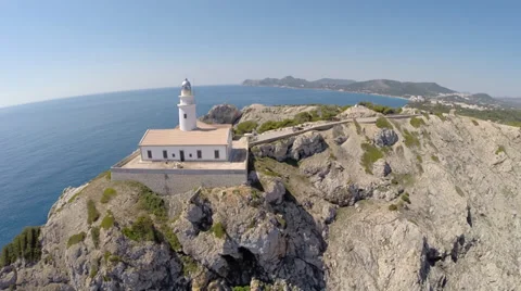 Lighthouse &amp; Cala Rajada in Background - Aerial Flight, Mallorca Stock Footage 38354904