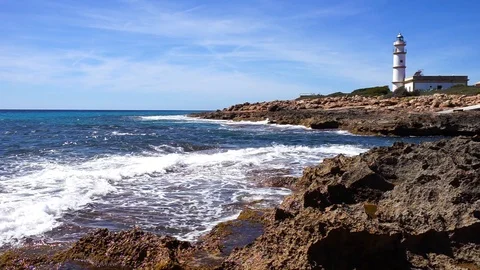 Lighthouse at Cape de Ses Salines on Majorca island, Spain Stock Footage 100680802