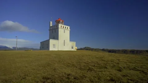 Lighthouse on Cape Dyrholaey. Large rectangular lighthouse Stockbeeldmateriaal 130462947