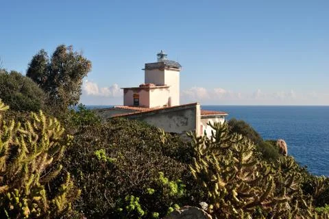 Lighthouse of Capo Ferrato Stock Photos