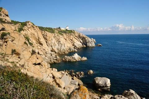Lighthouse of Capo Ferrato Stock Photos