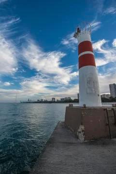 Lighthouse with chicago downtown in the back vertical Stock Photos