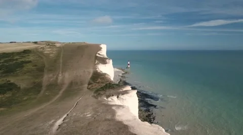 Lighthouse on a cliff area by the sea Stock Footage 67128104