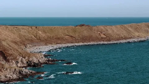 Lighthouse on a cliff bank  Stock Footage 84005626