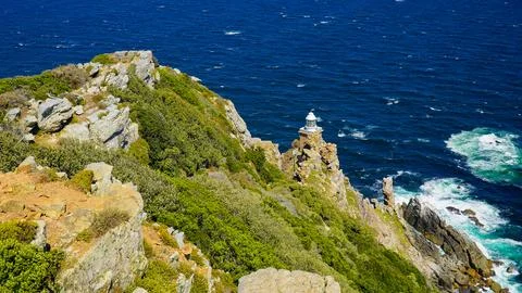 Lighthouse on Cliff Edge Stock Photos