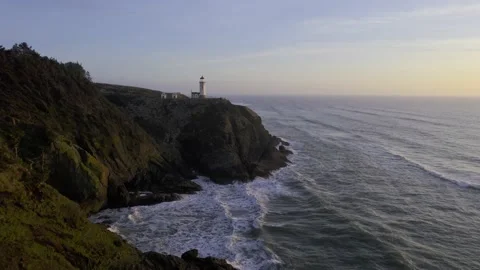 Lighthouse on a Cliff at Sunset Stock Footage 190731959