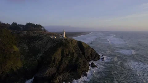 Lighthouse on a Cliff at Sunset Stock Footage 190735558