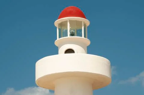 Lighthouse close-up with blue sky in the background Fotos de archivo