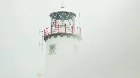 Lighthouse clouds close up Ireland Stock Footage 144535914
