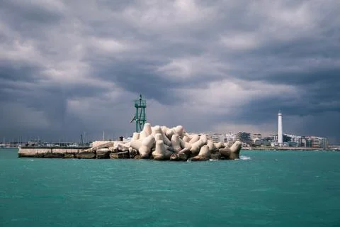 Lighthouse in a cloudy day with a storm approaching Stock Photos