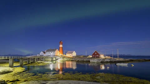 Lighthouse on the coast with aurora Stock Footage 250300271
