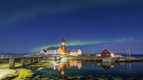 Lighthouse on the coast with northern lights Stock Footage 250300357
