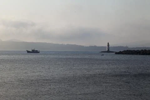 Lighthouse on the coast Stock Photos