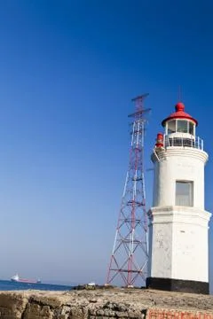 Lighthouse on the coast Stock Photos