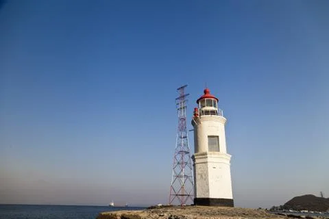 Lighthouse on the coast Stock Photos