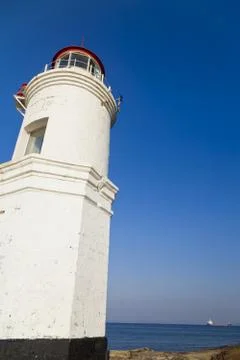 Lighthouse on the coast Stock Photos
