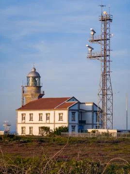 Lighthouse on the coast Stock Photos