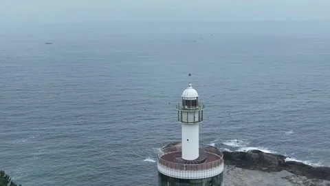 Lighthouse on the coast of the sea Stock Footage 310152649