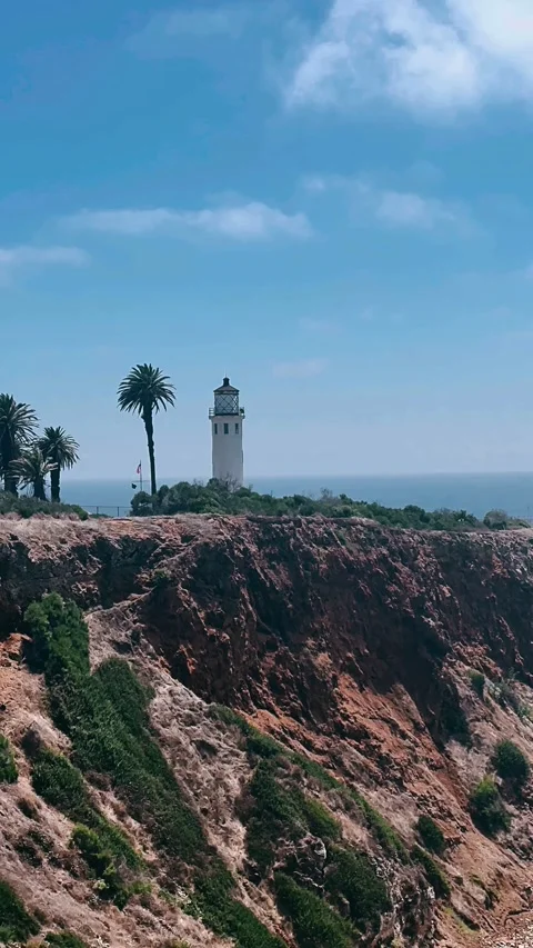 Lighthouse on the coast,lighthouse, light, coast, sky, tower, architecture Stock Footage 252311562