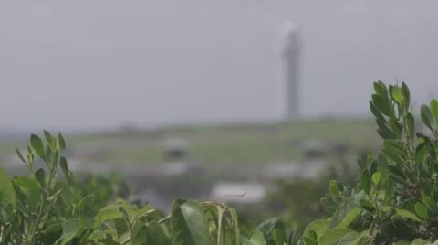 Lighthouse coming into focus in distance Stock Footage 56512890