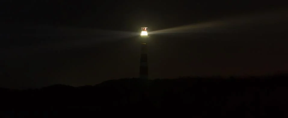 Lighthouse in the dark Stock Photos