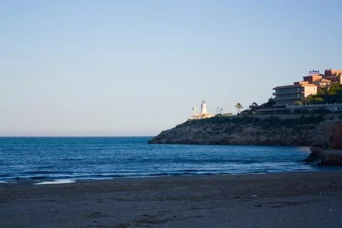 Lighthouse of the Dosel beach in the coastal town of Cullera (Valencia) Stock Photos