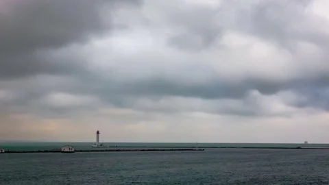Lighthouse with dramatic clouds. Stock Footage 70441793