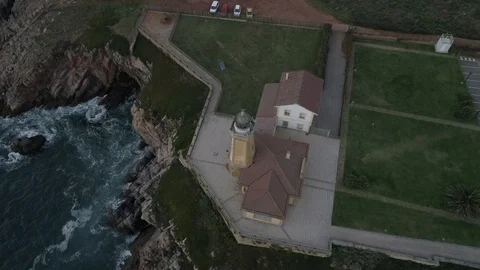Lighthouse drone view during sunset in Asturias, Spain Stock Footage 111980399