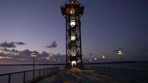 Lighthouse during evening with seascape Stock Footage 140996080