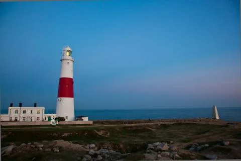 Lighthouse at dusk Stock Photos