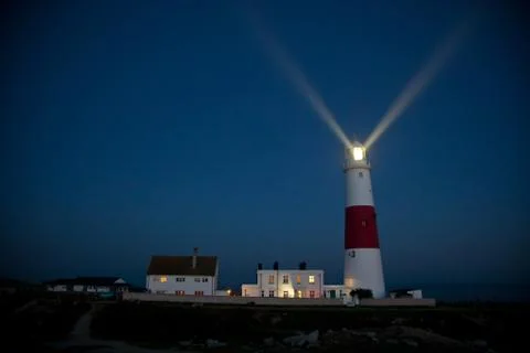 Lighthouse at dusk Stock Photos