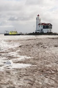 Lighthouse in dutch marken Stock Photos