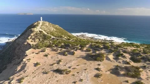 Lighthouse on edge of cliff Stock Footage 279295998