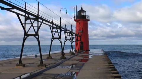 Lighthouse At End Of Pier Stock Footage 56586661