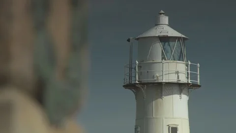 Lighthouse Gaurding The Headland. Stock-Footage 107370188